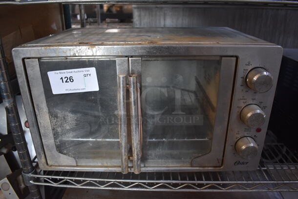 Oster Stainless Steel Countertop Toaster Oven. 22x14x13