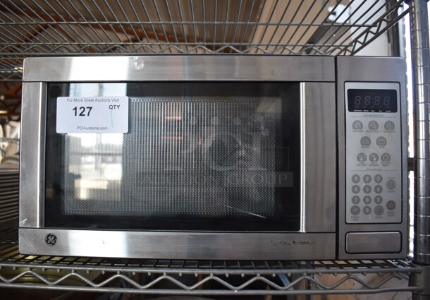 General Electric JES1142SJ 04 Stainless Steel Countertop Microwave Oven w/ Plate. 120 Volts, 1 Phase. 21x15x12
