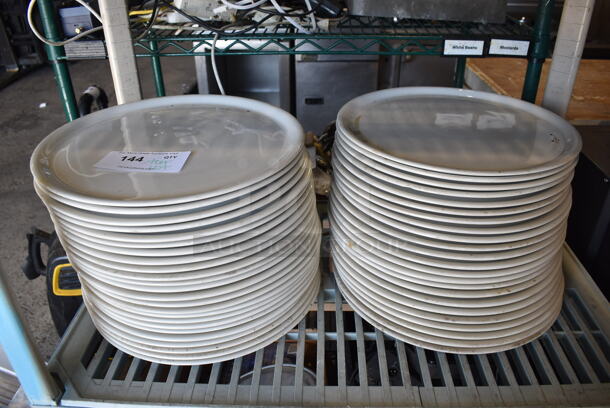 ALL ONE MONEY! Tier Lot of Approximately 47 White Ceramic Plates. 13x13x1 - Image 1 of 3