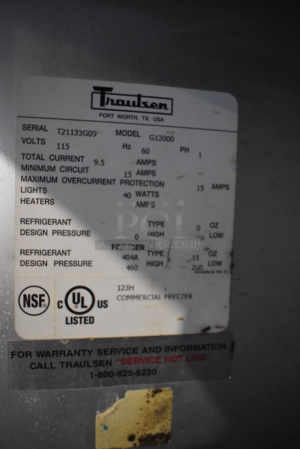 Traulsen G12000 Stainless Steel Commercial 2 Half Size Door Reach In Freezer w/ Poly Coated Racks on Commercial Casters. 115 Volts, 1 Phase. 30x34x83. Tested and Working! - Image 6 of 8