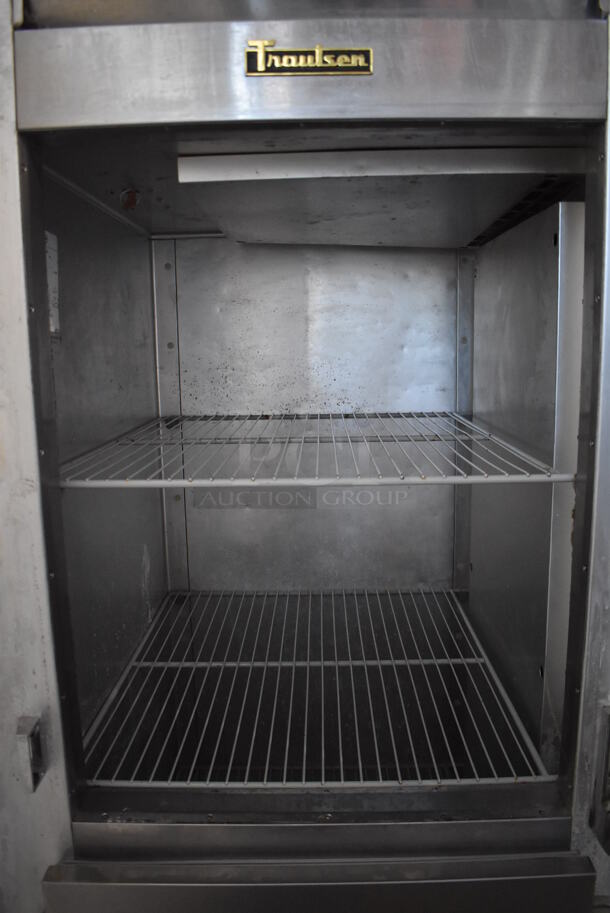 Traulsen G12000 Stainless Steel Commercial 2 Half Size Door Reach In Freezer w/ Poly Coated Racks on Commercial Casters. 115 Volts, 1 Phase. 30x34x83. Tested and Working! - Image 7 of 8