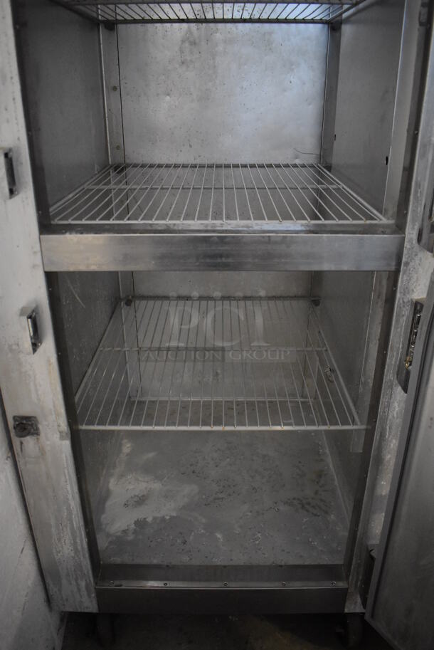Traulsen G12000 Stainless Steel Commercial 2 Half Size Door Reach In Freezer w/ Poly Coated Racks on Commercial Casters. 115 Volts, 1 Phase. 30x34x83. Tested and Working! - Image 8 of 8