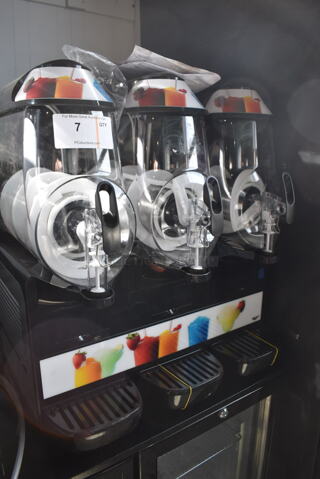 BRAND NEW SCRATCH AND DENT! Vollrath Commercial Countertop Triple Hopper Slushie Machine. 115 Volts, 1 Phase. 23x18x28. Tested and Working!