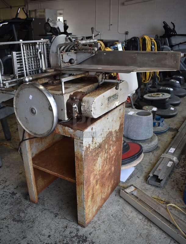 150/D Metal Commercial Floor Style Meat Slicer Stacker. 115 Volts, 1 Phase. 53x33x58. Tested and Powers On But Parts Do Not Move - Image 1 of 10