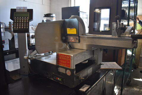 Bizerba A 404 US Stainless Steel Commercial Countertop Meat Slicer Stacker. 120 Volts, 1 Phase. Goes GREAT w/ Lot 47! 37.5x25x27. Tested and Working!