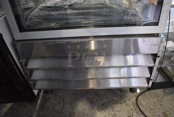 BRAND NEW SCRATCH AND DENT! KoolMore RIR-1D-GD Stainless Steel Commercial Single Door Reach In Cooler Merchandiser w/ Poly Coated Racks on Commercial Casters. 115 Volts, 1 Phase. 29x32x83. Tested and Working! - Image 7 of 7