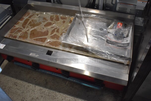 BRAND NEW SCRATCH AND DENT! Avantco 177CAG Stainless Steel Commercial Countertop Gas Powered Flat Top Griddle. 48x30x12