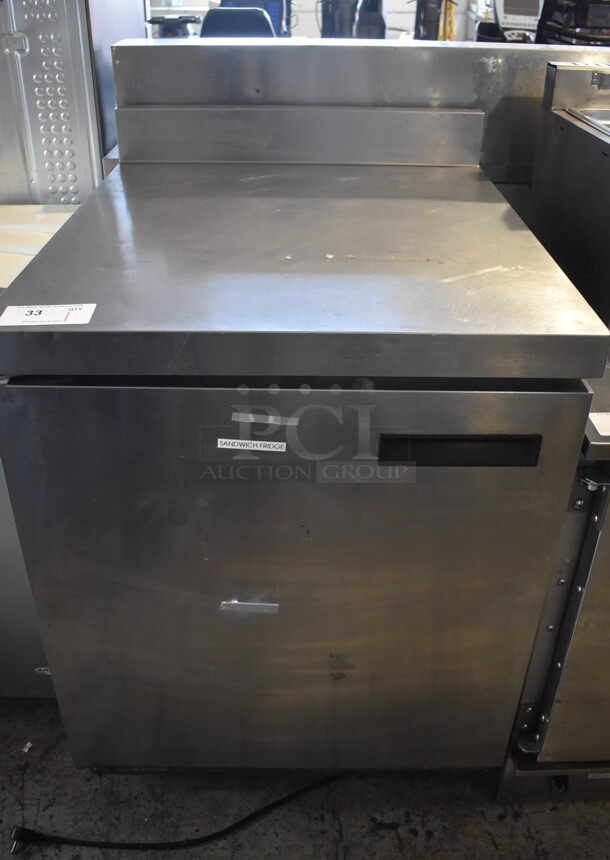 2014 Delfield ST4427N-DHL Stainless Steel Commercial Single Door Work Top Cooler on Commercial Casters. 115 Volts, 1 Phase. 27x32x40. Tested and Powers On But Does Not Get Cold