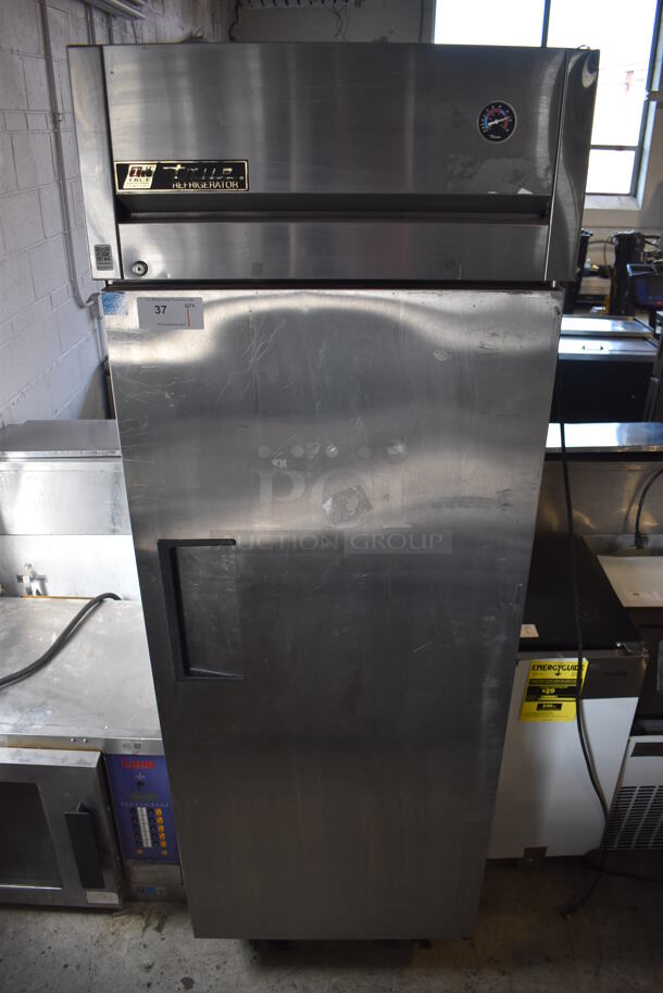 2012 True TG1R-1S ENERGY STAR Stainless Steel Commercial Single Door Reach In Cooler w/ Poly Coated Racks on Commercial Casters. 115 Volts, 1 Phase. 29x35x83. Tested and Working!