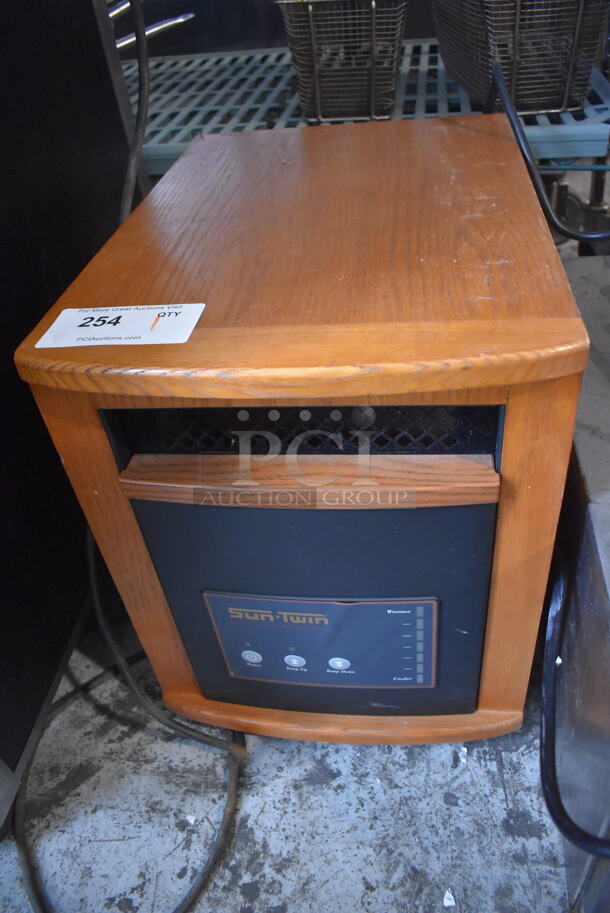 Sun Twin 1500 Elite Wood Pattern Portable Heater on Casters. 120 Volts, 1 Phase. 13.5x19.5x17.5. Tested and Working!
