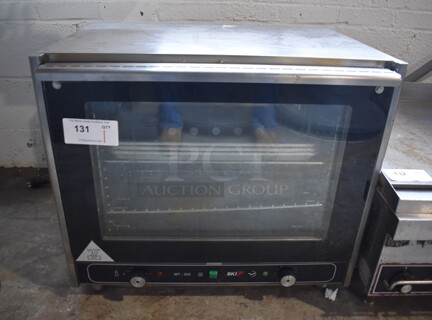 BKI MT200 Stainless Steel Commercial Countertop Electric Powered Convection Oven w/ View Through Doors and Metal Oven Racks. 250 Volts, 1 Phase. 28x24x24