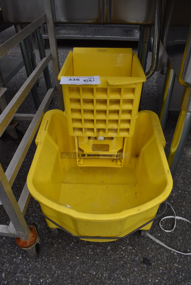 Yellow Poly Mop Bucket w/ Wringing Attachment on Casters. 17x24x34