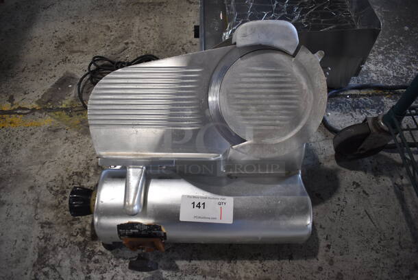 Stainless Steel Commercial Countertop Meat Slicer w/ Blade Sharpener. Does Not Have Arm or Carriage. 115 Volts, 1 Phase. 19x17x15. Cannot Test Due To Cut Power Cord