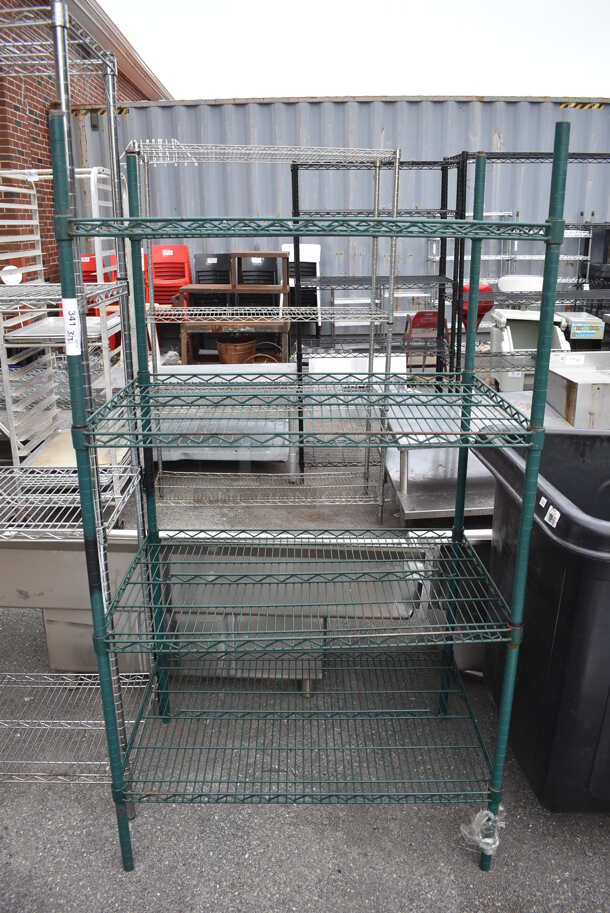 Green Finish 4 Tier Wire Shelving Unit. BUYER MUST DISMANTLE. PCI CANNOT DISMANTLE FOR SHIPPING. PLEASE CONSIDER FREIGHT CHARGES. 36x24x67