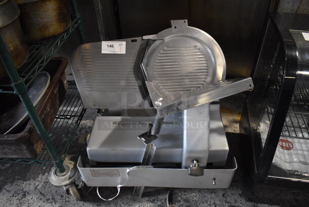 Stainless Steel Commercial Countertop Automatic Meat Slicer. 115 Volts, 1 Phase. 29x20x25. Tested and Does Not Power On