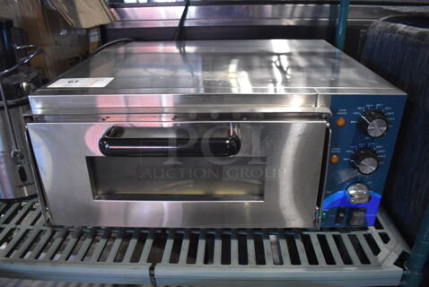 BRAND NEW SCRATCH AND DENT! 2022 Hoocoo CMO-1 Stainless Steel Commercial Countertop Electric Powered Pizza Oven w/ Thermostatic Controls. 120 Volts, 1 Phase. 23x20x12
