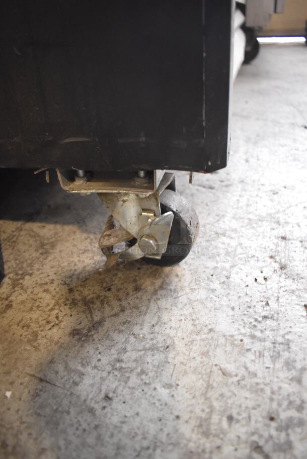 BRAND NEW SCRATCH AND DENT! KoolMore MDR-2D-GSLD Metal Commercial 2 Door Reach In Cooler Merchandiser w/ Poly Coated Racks on Commercial Casters. 115 Volts, 1 Phase. 54x30x83. Tested and Working! - Image 6 of 9