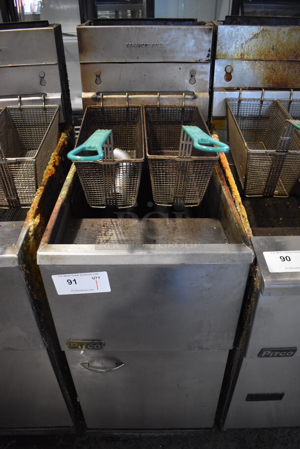 Pitco Frialator SG14 Stainless Steel Commercial Floor Style Natural Gas Powered Deep Fat Fryer w/ 2 Metal Fry Baskets. 15.5x34x48