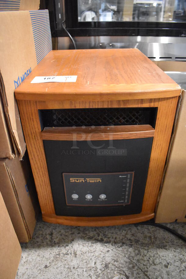 Sun Twin 1500 Elite Wood Pattern Portable Heater on Casters. 120 Volts, 1 Phase. 13.5x19.5x17.5. Tested and Powers On But Does Not Get Warm - Image 1 of 4