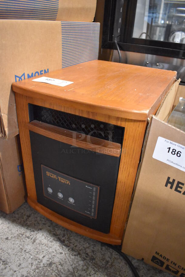 Sun Twin 1500 Elite Wood Pattern Portable Heater on Casters. 120 Volts, 1 Phase. 13.5x19.5x17.5. Tested and Powers On But Does Not Get Warm - Image 2 of 4