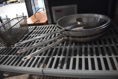 4 Various Metal Skillets. Includes 26x14.5x2. 4 Times Your Bid!