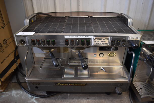 La Cimbali M29 Stainless Steel Commercial Countertop 2 Group Espresso Machine w/ 2 Portafilters and 2 Steam Wands. 208 Volts, 1 Phase. 30.5x22x24