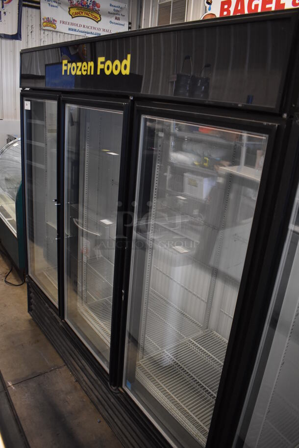 2013 True GDM-72F-LD ENERGY STAR Metal Commercial 3 Door Reach In Freezer Merchandiser. 115/208-230 Volts, 1 Phase. 77x30.5x78