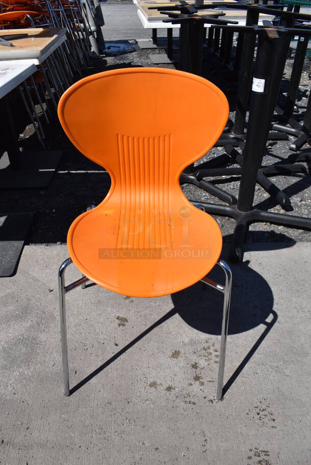 8 Orange Poly Dining Height Chairs on Metal Legs. Stock Picture - Cosmetic Condition May Vary. 18x16x32. 8 Times Your Bid!