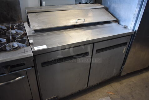 Arctic Air AST48R Stainless Steel Commercial Sandwich Salad Prep Table Bain Marie Mega Top on Commercial Casters. 115 Volts, 1 Phase. 48x30x43. Tested and Powers On But Does Not Get Cold