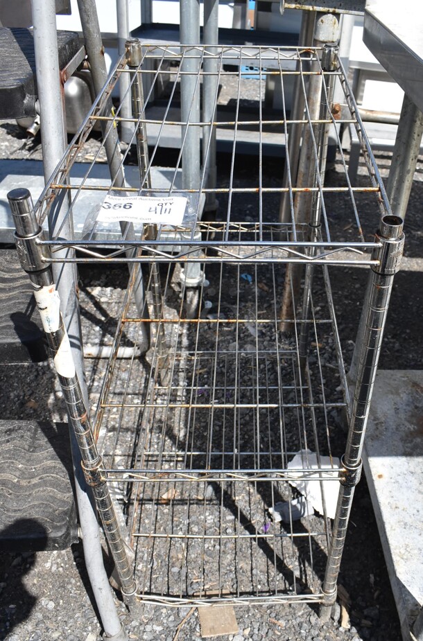 Chrome Finish 3 Tier Wire Shelving Unit. BUYER MUST DISMANTLE. PCI CANNOT DISMANTLE FOR SHIPPING. PLEASE CONSIDER FREIGHT CHARGES. 23x13x29 - Image 1 of 3