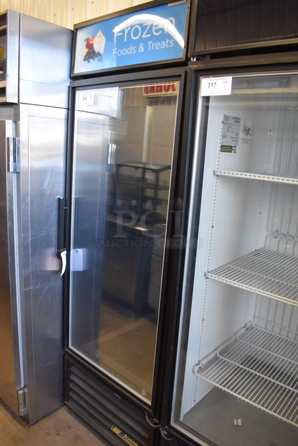 2012 True GDM-19T-F-LD Metal Commercial Single Door Reach In Freezer Merchandiser. 115 Volts, 1 Phase. 27x31x78. Tested and Working!