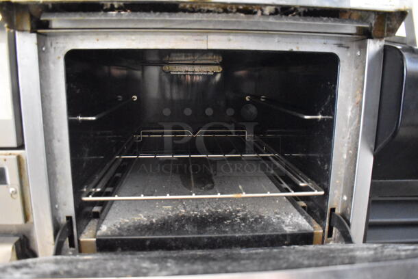 Southbend Stainless Steel Commercial Natural Gas Powered 4 Burner Range w/ Oven, Over Shelf and Back Splash on Commercial Casters. 24.5x34.5x40 - Image 5 of 5