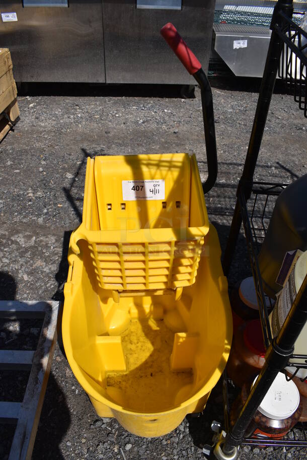 Rubbermaid Yellow Poly Mop Bucket w/ Wringing Attachment on Commercial Casters. 15x18x36