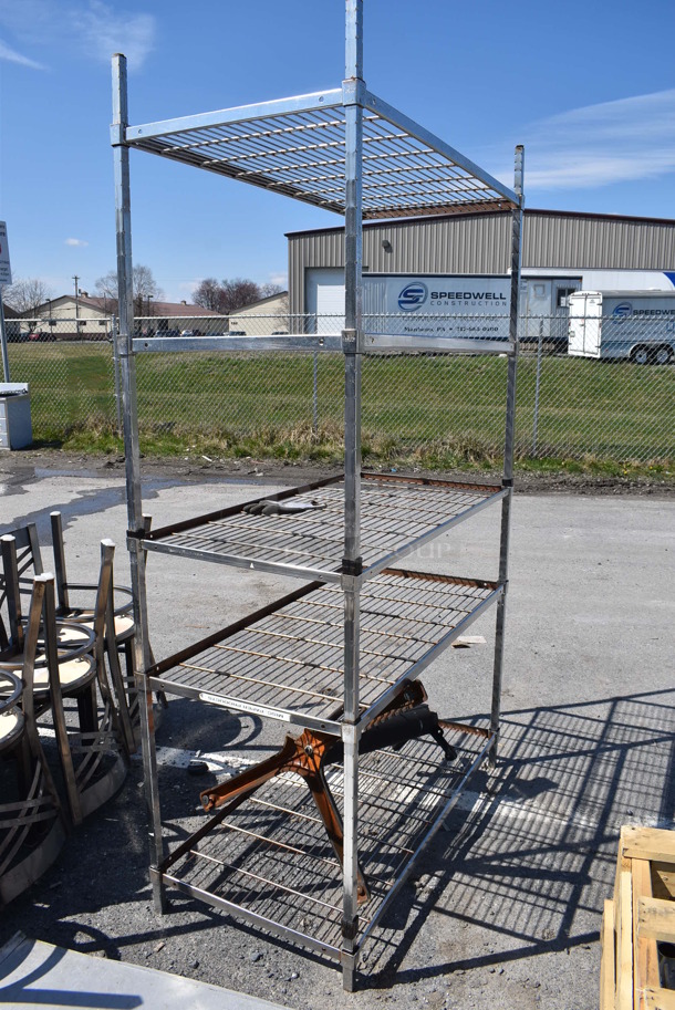 Chrome Finish 5 Tier Wire Shelving Unit. BUYER MUST DISMANTLE. PCI CANNOT DISMANTLE FOR SHIPPING. PLEASE CONSIDER FREIGHT CHARGES. 48x24x84 - Image 1 of 3