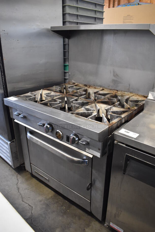 Southbend Stainless Steel Commercial Natural Gas Powered 6 Burner Range w/ Oven, Over Shelf and Back Splash on Commercial Casters. Missing Burners. 36x34x58