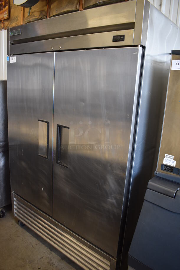 2017 True T-49F-HC ENERGY STAR Stainless Steel Commercial 2 Door Reach In Freezer w/ Poly Coated Racks on Commercial Casters. 115 Volts, 1 Phase. 54x30x83. Tested and Working!