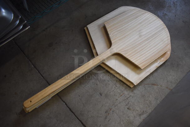 4 Various Wooden Pizza Peels. Includes 21x43x1. 4 Times Your Bid!