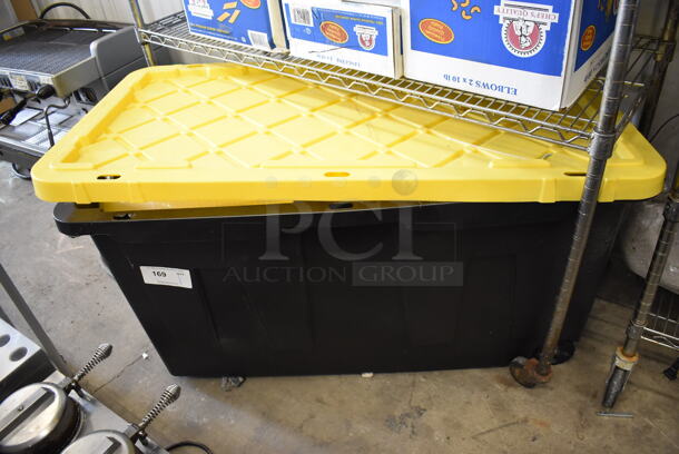 Black and Yellow Poly Bin w/ Plastic Containers. 37x21x25
