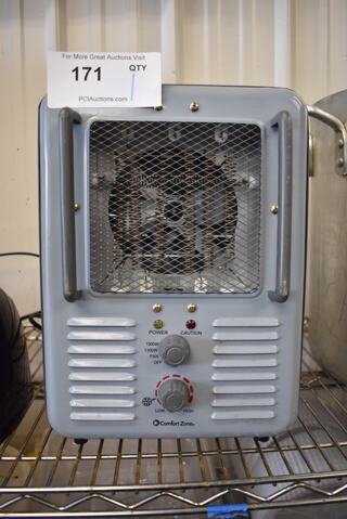 Comfort Zone Metal Heater. 10x6x13.5. Tested and Powers On But Parts Do Not Move