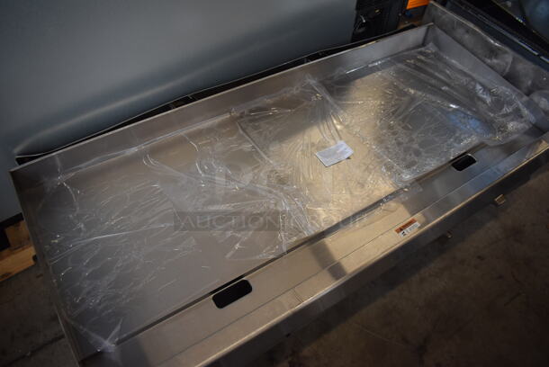 BRAND NEW SCRATCH AND DENT! 2022 Cooking Performance Group 351GTCPG72NL Stainless Steel Commercial Countertop 72" Natural Gas Powered Flat Top Griddle w/ Thermostatic Controls. Missing Knobs and 1 Burner. 180,000 BTU. 72x30x13 - Image 3 of 9