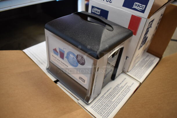 4 BRAND NEW IN BOX! Tork Xpressnap Black and Clear Poly Napkin Dispensers. 6.5x6.5x6.5. 4 Times Your Bid! - Image 2 of 5