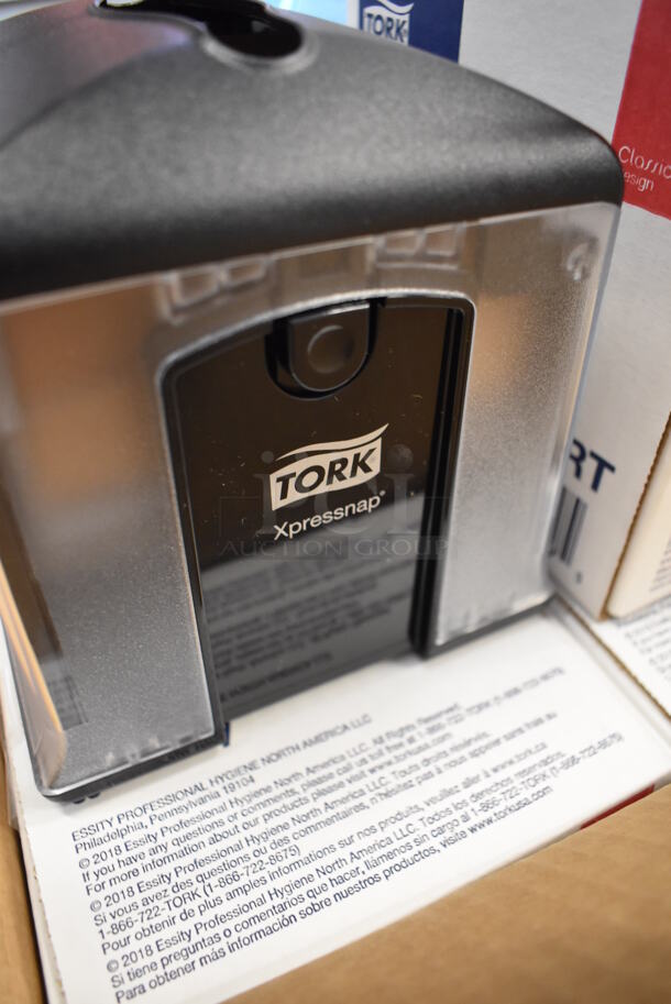 4 BRAND NEW IN BOX! Tork Xpressnap Black and Clear Poly Napkin Dispensers. 6.5x6.5x6.5. 4 Times Your Bid! - Image 3 of 5