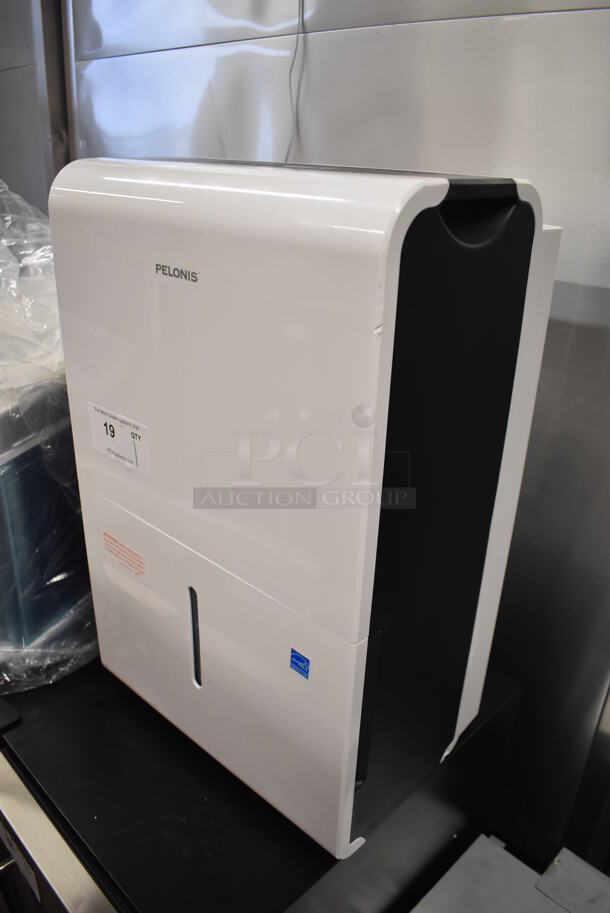 BRAND NEW SCRATCH AND DENT! Pelonis PAD40C1AWT Metal Portable Dehumidifier on Casters. 115 Volts, 1 Phase. 15.5x11x24. Tested and Working! - Image 2 of 6
