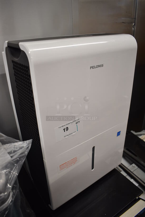 BRAND NEW SCRATCH AND DENT! Pelonis PAD40C1AWT Metal Portable Dehumidifier on Casters. 115 Volts, 1 Phase. 15.5x11x24. Tested and Working! - Image 3 of 6