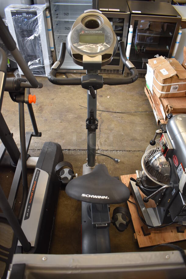 Schwinn Metal Commercial Floor Style Stationary Bicycle Exercise Machine. 20x43x52. Tested and Working But Screens Do Not Power On