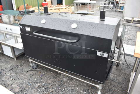 BRAND NEW SCRATCH AND DENT! Backyard Pro 554SMOKR60AS Metal Commercial Charcoal / Wood Smoker Grill with Adjustable Grates and Dome on Commercial Casters. Missing Hardware. 72x31x50