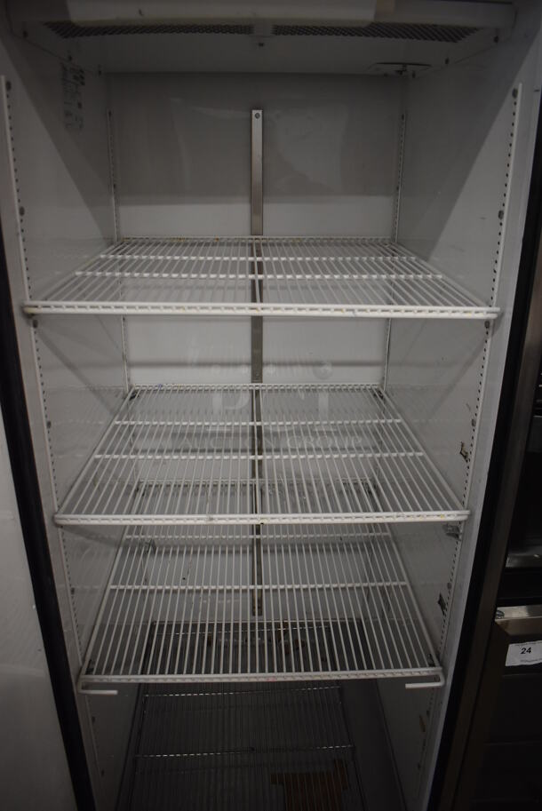 2011 True TG1F-1S Stainless Steel Commercial Single Door Reach In Freezer w/ Poly Coated Racks on Commercial Casters. 115 Volts, 1 Phase. 29x35x83. Tested and Working! - Image 4 of 6