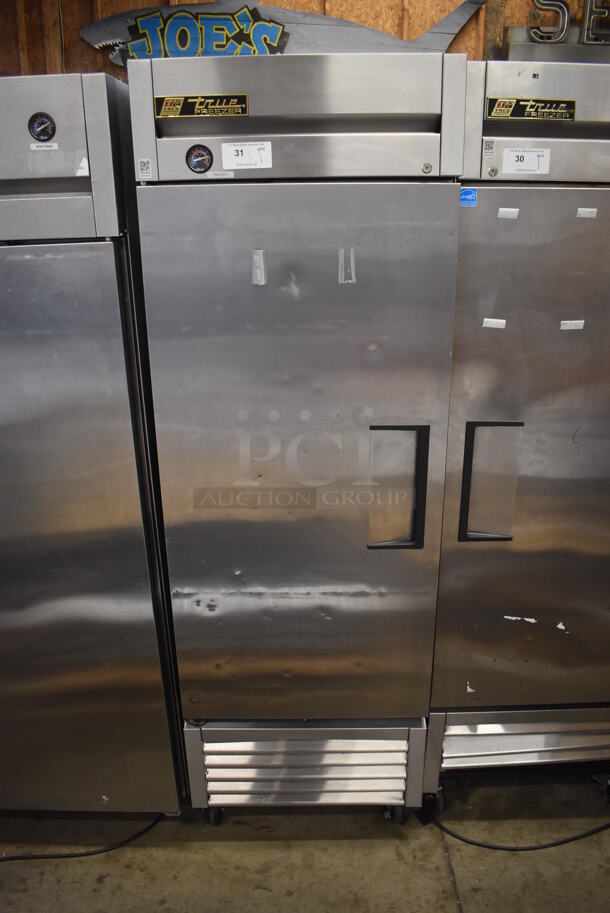 2013 True T-23F ENERGY STAR Stainless Steel Commercial Single Door Reach In Freezer on Commercial Casters. 115 Volts, 1 Phase. 27x30x84. Tested and Working!