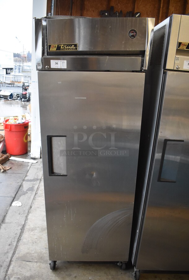 2012 True TG1F-1S Stainless Steel Commercial Single Door Reach In Freezer w/ Poly Coated Racks on Commercial Casters. 115 Volts, 1 Phase. 29x35x83. Tested and Working! - Image 1 of 7