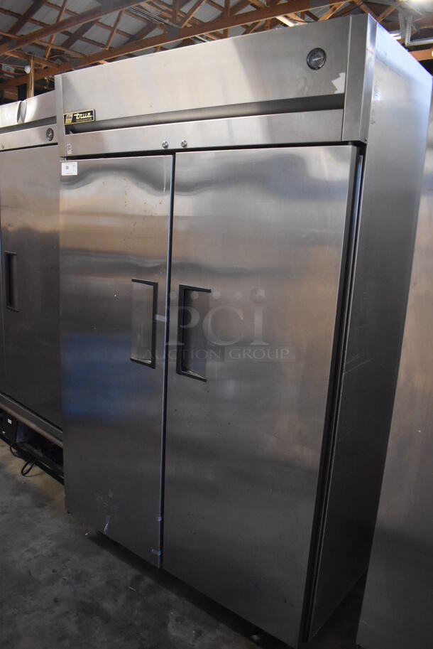 2011 True TG2R-2S Stainless Steel Commercial 2 Door Reach In Cooler w/ Poly Coated Racks on Commercial Casters. 115 Volts, 1 Phase. 51x35x83. Tested and Working!